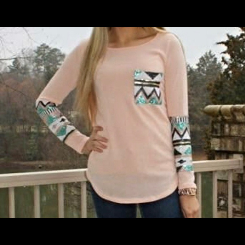 Sequin accent blouse.